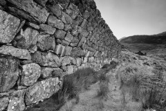 Spoil heap retaining wall
